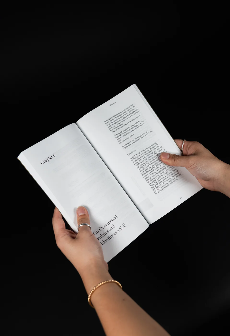 The Chapter 6 opener: a mostly empty left page with the chapter title set large and low, facing the first page of text