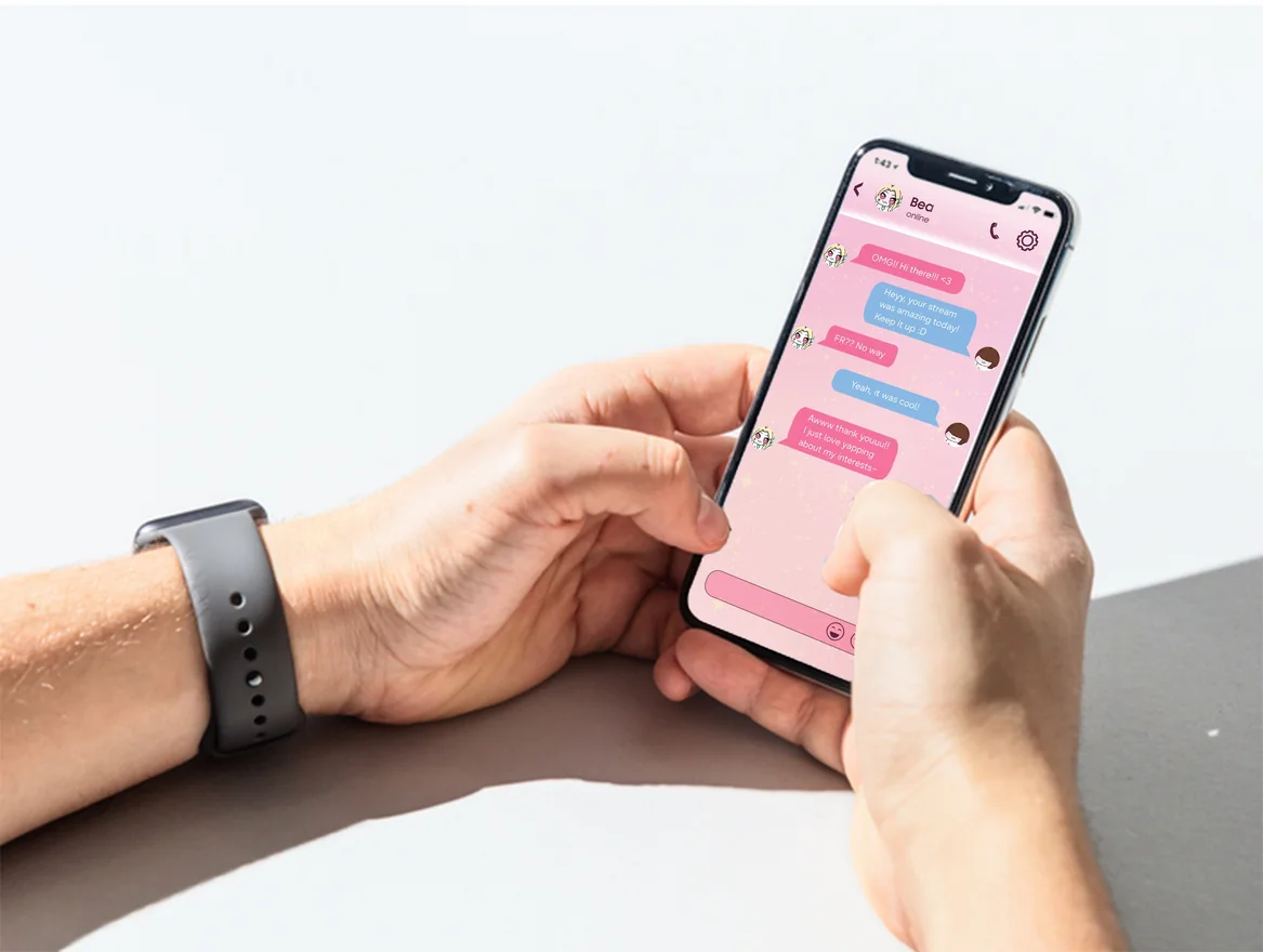 Hands holding a regular smartphone showing the messaging demo