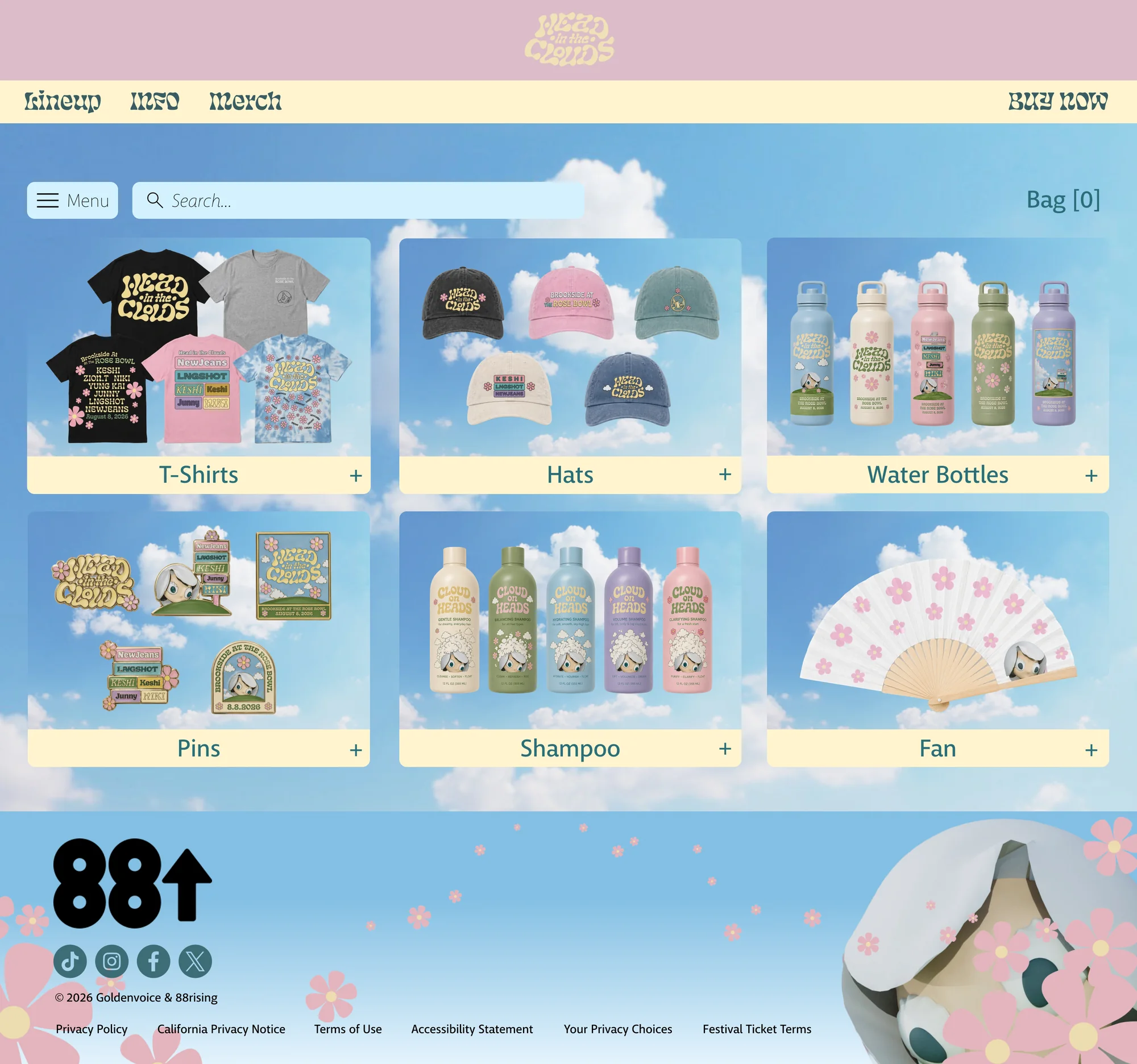 Merch page on a sky background with cloud-backed cards for t-shirts, hats, water bottles, pins, shampoo, and a hand fan, desktop layout