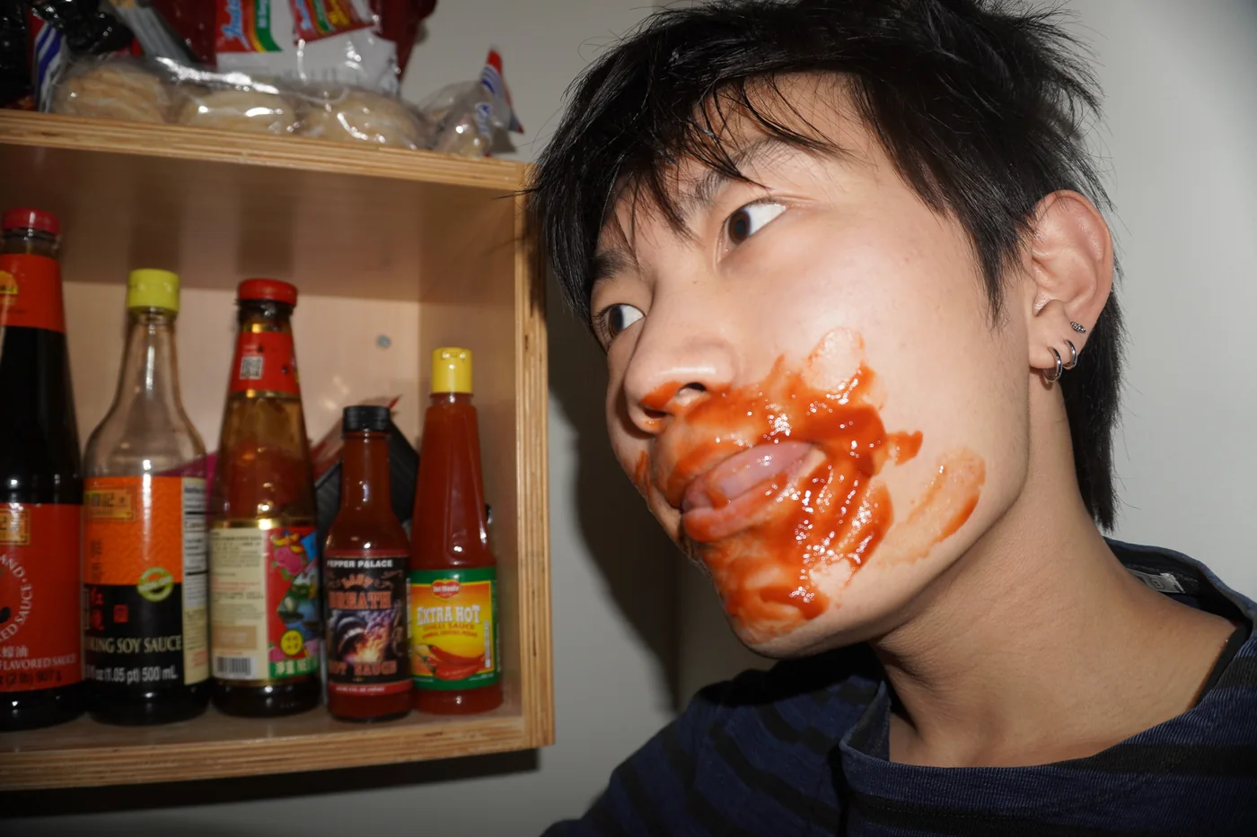 Drinking sauce straight from a bottle