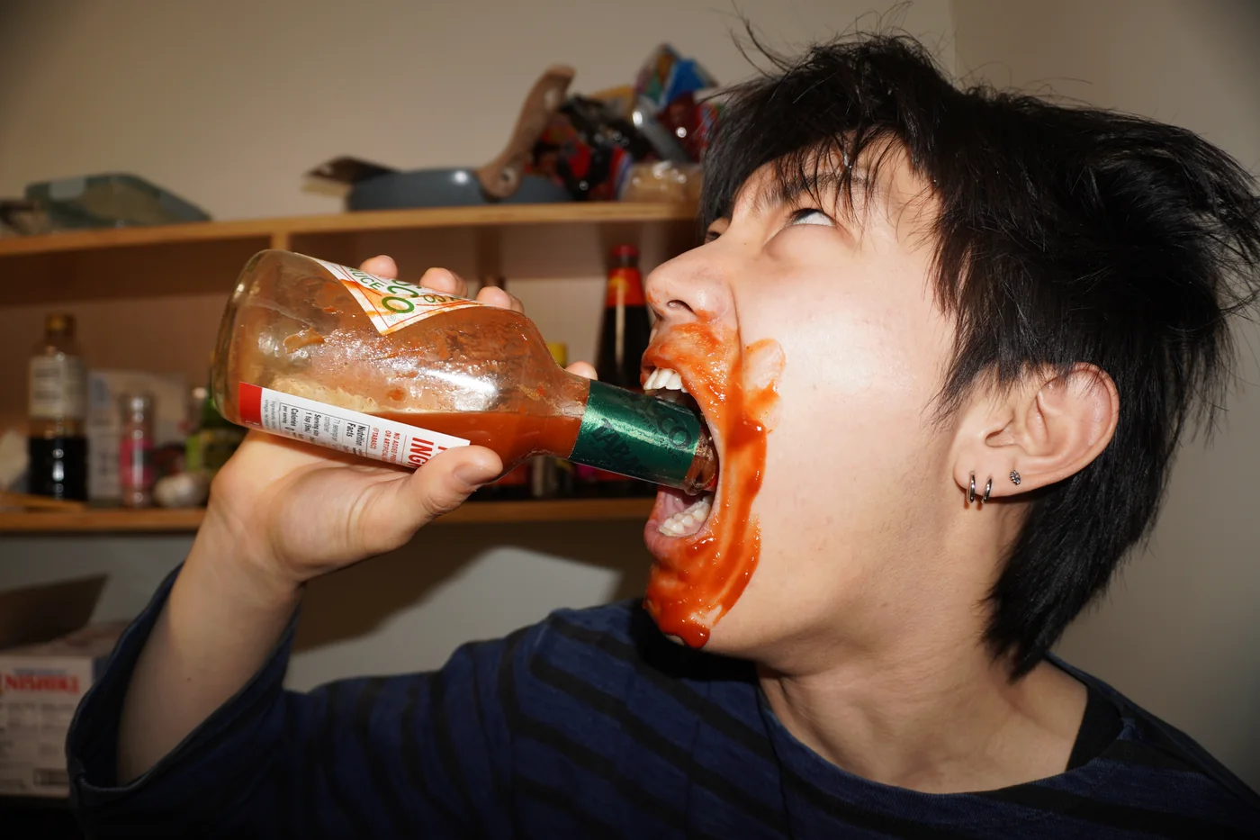 Eating sauce straight off a spoon